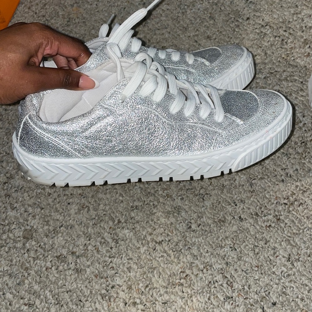 Silver tennis shoes